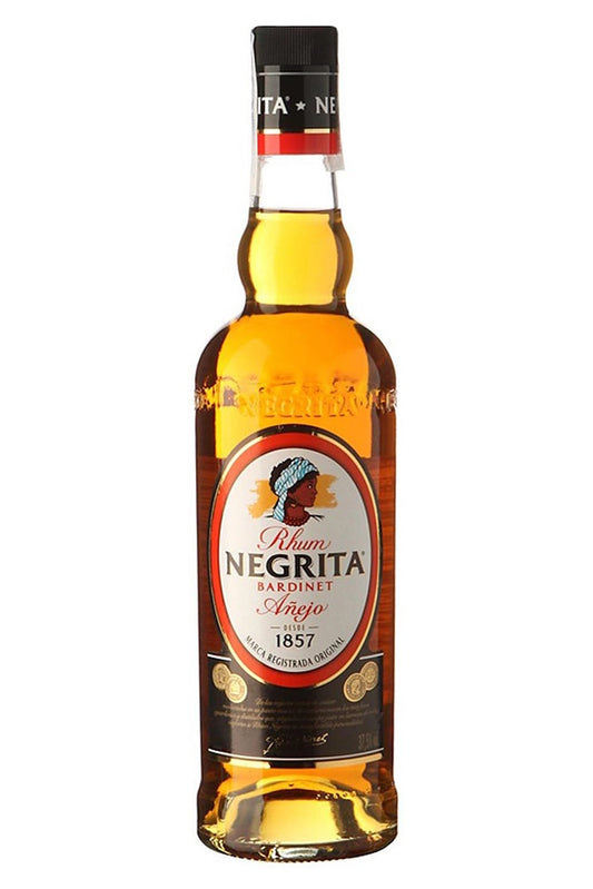 Botella de 70 cl de Ron Negrita, un ron tradicional francés con estilo caribeño. Sabor suave con notas de caramelo, vainilla y especias. Color ámbar claro. Producido por Bardinet desde el siglo XIX. Apto para cócteles y recetas de cocina. Presentado en botella de vidrio.