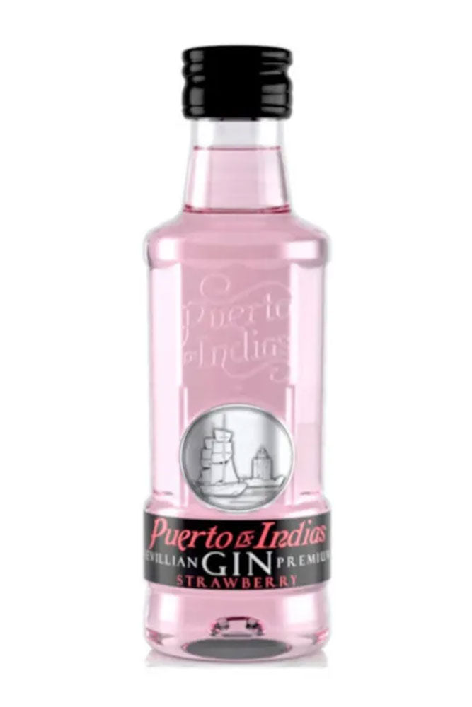 Botella mini de Ginebra Puerto de Indias 5 cl, rosa afrutada con fresas naturales. Suave y refrescante, perfecta para gin-tonics y regalos.