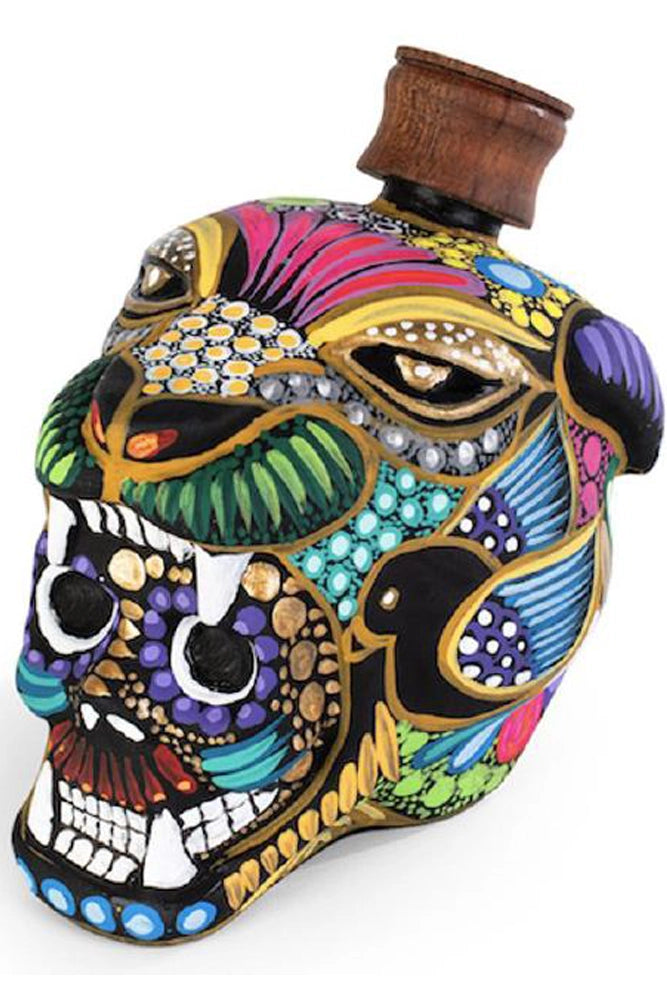 Botella de 70 cl de Mezcal Guerrero Jaguar reposado 100% espadín, ámbar claro y producción artesanal de Oaxaca