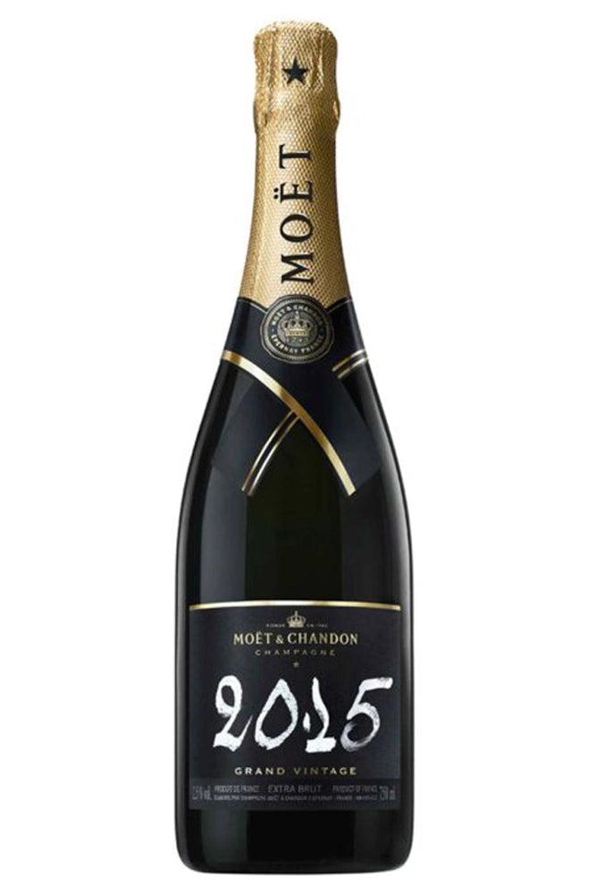 Botella de Moët & Chandon Grand Vintage 2015 75 cl, tono dorado brillante, símbolo de madurez, complejidad aromática y elegancia.