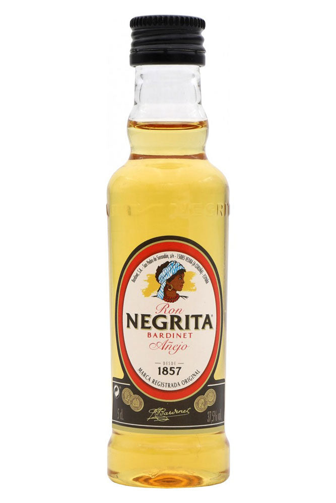 Botella mini de Ron Negrita 5 cl, ron dorado clásico con notas de vainilla, caramelo y especias. Ideal para combinados y degustación.