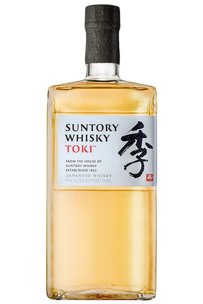 Botella Suntory Toki, whisky japonés fresco con notas de manzana verde, miel, vainilla y madera ligera.