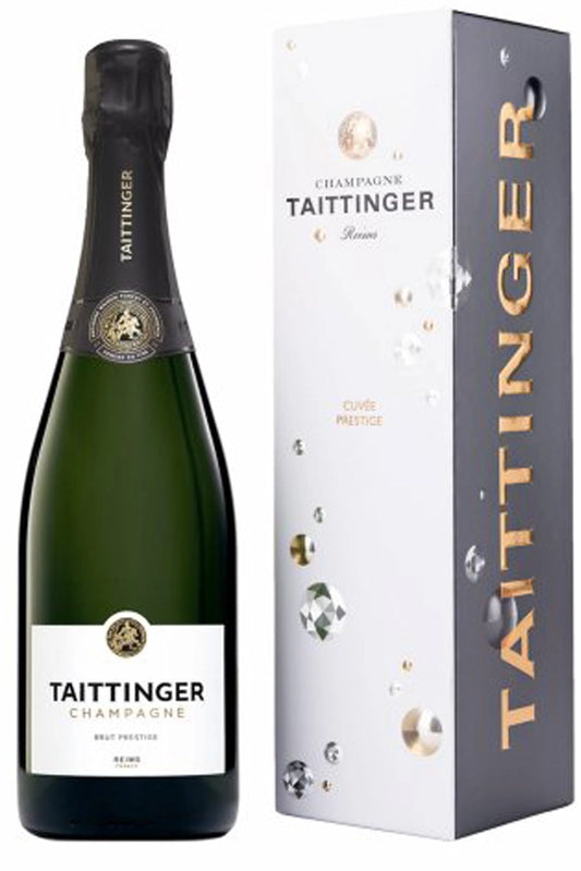 Botella de Taittinger Brut Prestige 75 cl, champagne dorado y elegante con burbuja fina y estilo fresco característico de la maison.
