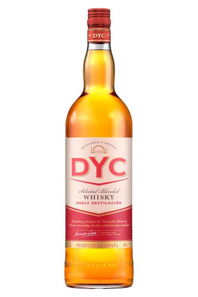 Botella de 1 L de Whisky DYC. Blended español ámbar 40º. Sabor suave, con cereal y madera, ideal para combinados y hostelería.