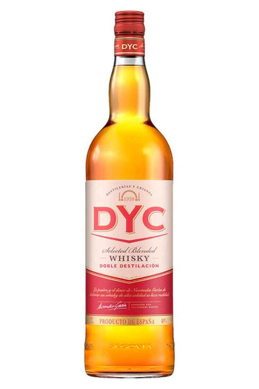 Botella de 1 L de Whisky DYC. Blended español ámbar 40º. Sabor suave, con cereal y madera, ideal para combinados y hostelería.