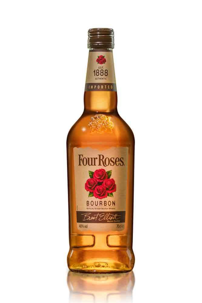 Botella de 70 cl de Four Roses. Bourbon americano ámbar claro 40º. Suave, con miel, vainilla y especias. Madurado en roble americano.