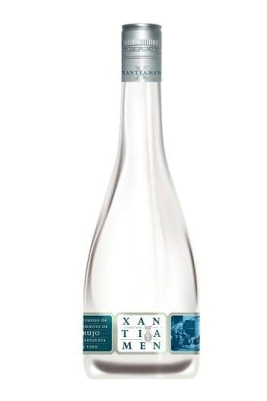 Botella de Orujo Blanco Xantiamén 70 cl, aguardiente gallego destilado en cobre. Potente, seco y auténtico, ideal para sobremesas tradicionales.